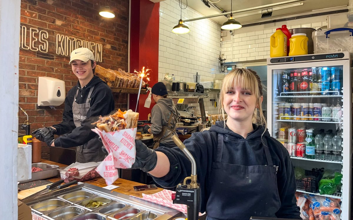 Friendly staff holding up The Harry Trotter