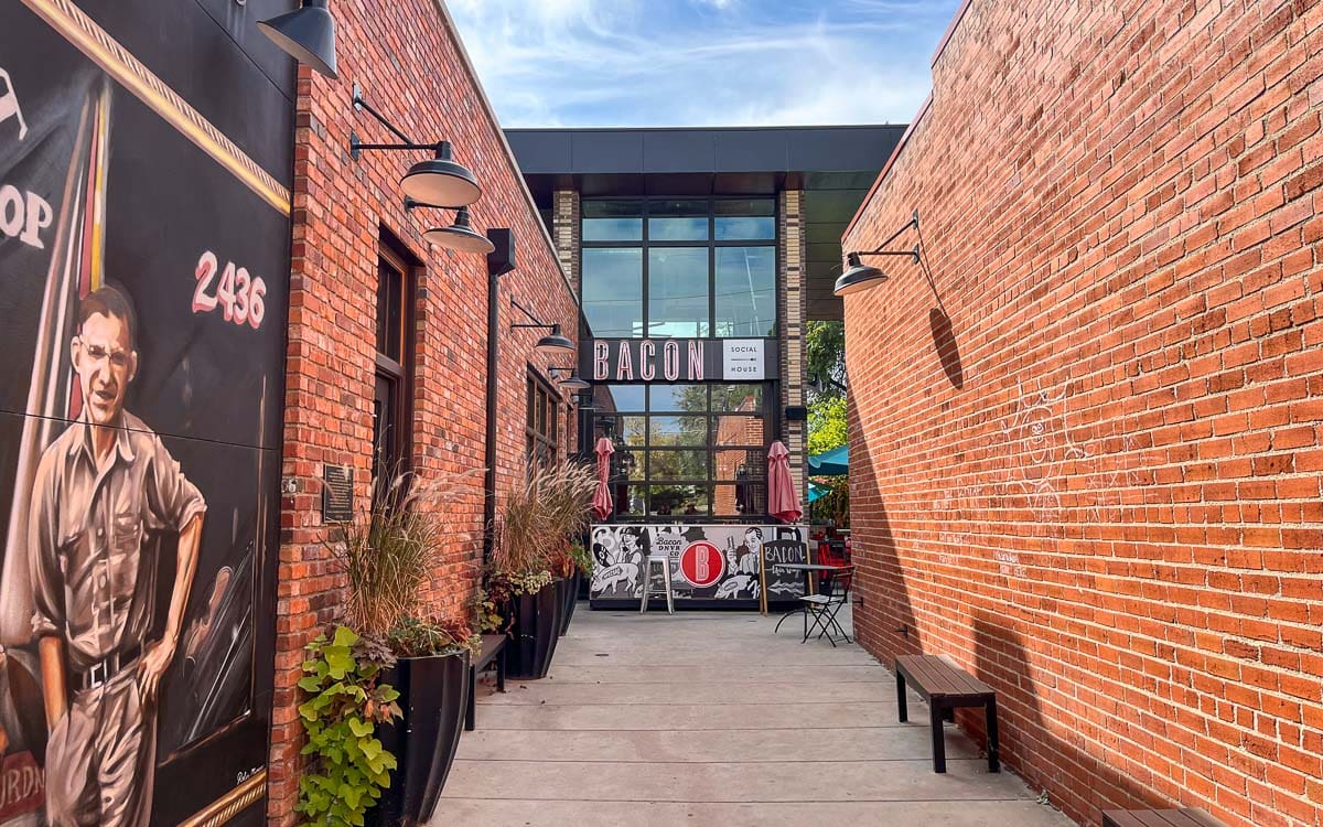 Down this brick alleyway is Bacon Social House, a popular brunch spot in Denver, Colorado